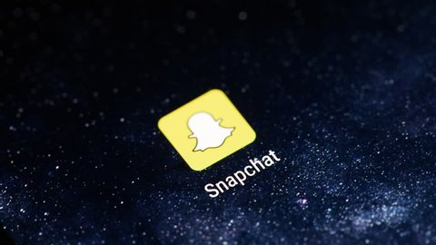 New york, USA - April 5, 2018: Open snapchat  moblie application menu on smartphone screen close-up