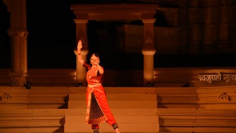 KHAJURAHO, INDIA 23 FEBRUARY 2018 : Dancers wearing traditional dresses and perform classical dance during the Festival in India.