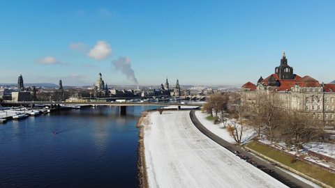 4K Aerial drone shot of Dresden Elbe River shot in winter landscape with Frauenkirche Germany