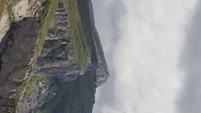 Vertical video. Clouds over the cliff. The ridge of Ai-Petri. Crimea