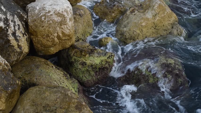Waves Crashing on Rocks