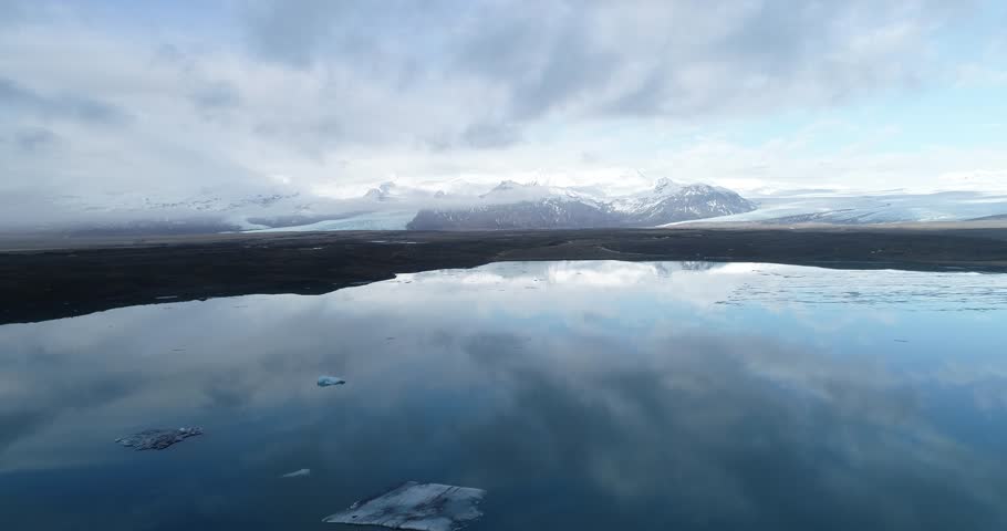 Mountains and ice lagoon Jokulsarlon in Iceland.Beautiful scenery. | Shutterstock HD Video #1009585052