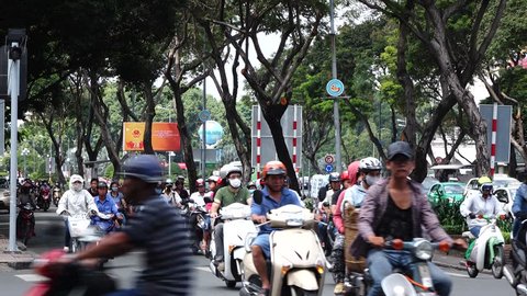Ho Chi Minh City - Vietnam, 12 Sept 2015: Overview central of Ho Chi Minh City. The life of the people in Ho Chi Min City (Saigon) with more motocycle, car,... in the busy day.