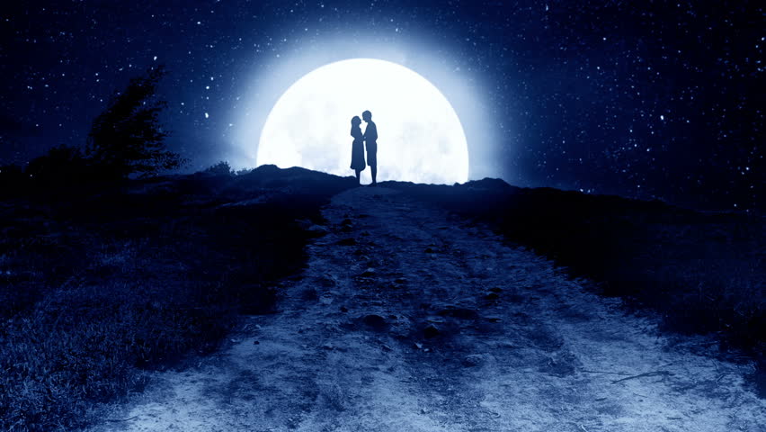 Cuddling couple on the hill at night with the moon in the background.

Fantasy view at cuddling couple on the hill at night.