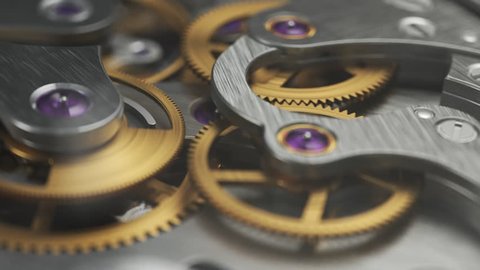 Luxury watch with working gears and mechanism visible through glass cover. Close up.