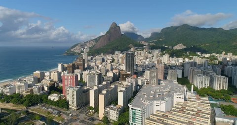 Aerial view above Ipanema city buildings and Two Brother Mountains in the distance. Rio de Janeiro, Brazil