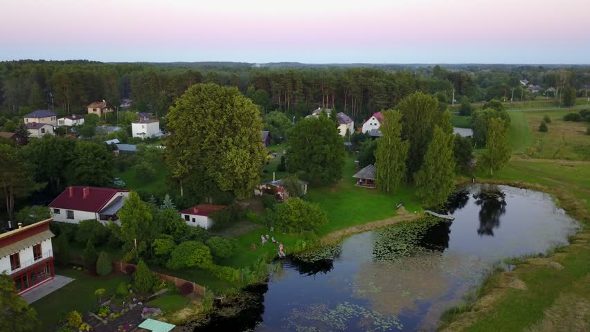 Aerial view of countryside Gauja lake field drone top view 4K UHD video