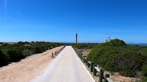 Driving towards Ponta do Altar lighthouse, located in Ferragudo, Algarve south of Portugal