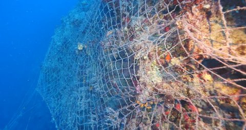ghost hunting fish net so big underwater fisherman pollution underwater garbage environmental harming oceans driftnets