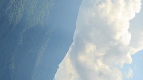 Vertical video. Mountains in the clouds. Time Lapse. Krasnaya Polyana, Sochi, Russia