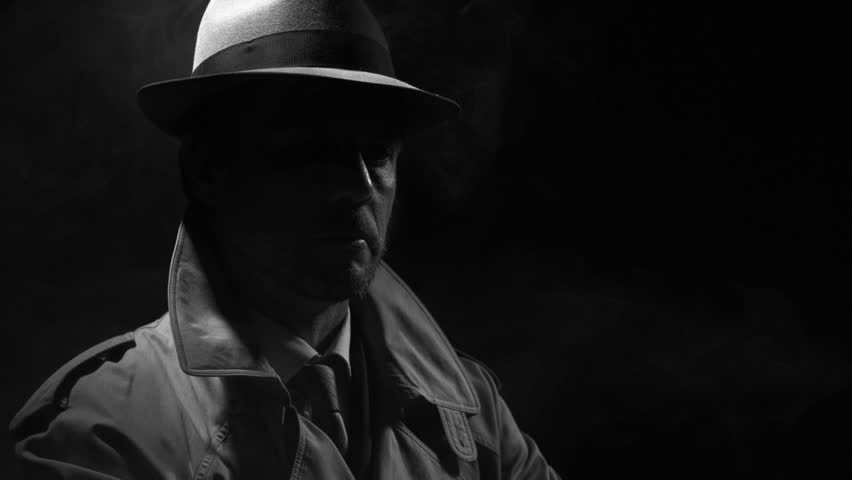 Retro noir film character: confident investigator standing in the dark and adjusting his trench coat