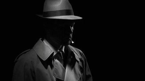 Noir film detective standing in the dark and smoking a cigarette, he is wearing a trench coat and a fedora hat