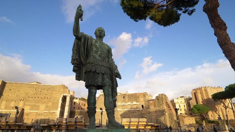 Statue of emperor Julius Caesar along Via dei Fori Imperiali at the Roman Forum in Rome, Italy