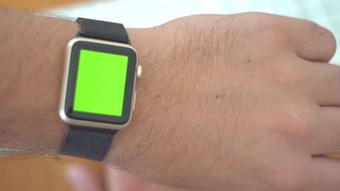 Checking Digital Apple Watch While Working - Green Screen 