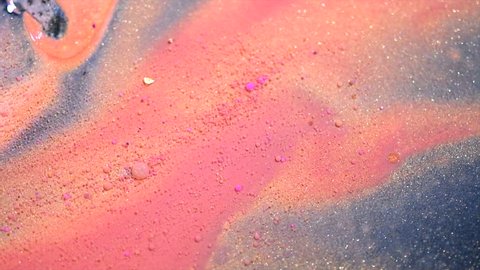 Beautiful Abstract beige and pink background with bright bubbles of vivid paint. Make-up. Beauty backdrop design. Liquid makeup foundation moving close-up. Macro shooting 4K UHD video 
