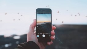Cinemagraph animation of a peaceful seaside, photographing a group of birds passing by. - Powered by Shutterstock - Get 15% off with code: PIKWIZARD15