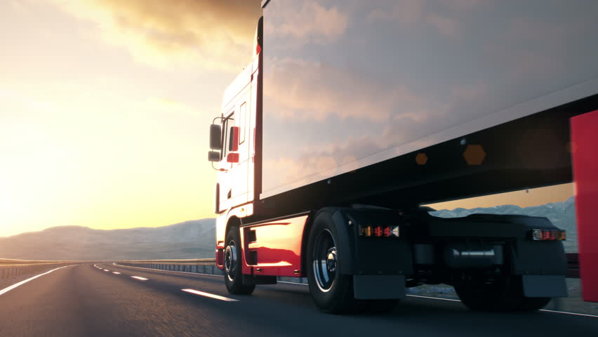 A semi truck passes the camera driving on a highway into the sunset, back-view low angle camera. Realistic high quality 3d animation.
 | Shutterstock HD Video #1009727831
