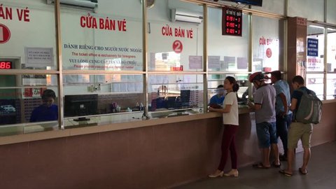 DA NANG, VIETNAM - OCT 2017: People buy tickets at Da Nang Railway Station, one of the main railway stations on the North South Railway (Reunification Express) in Vietnam