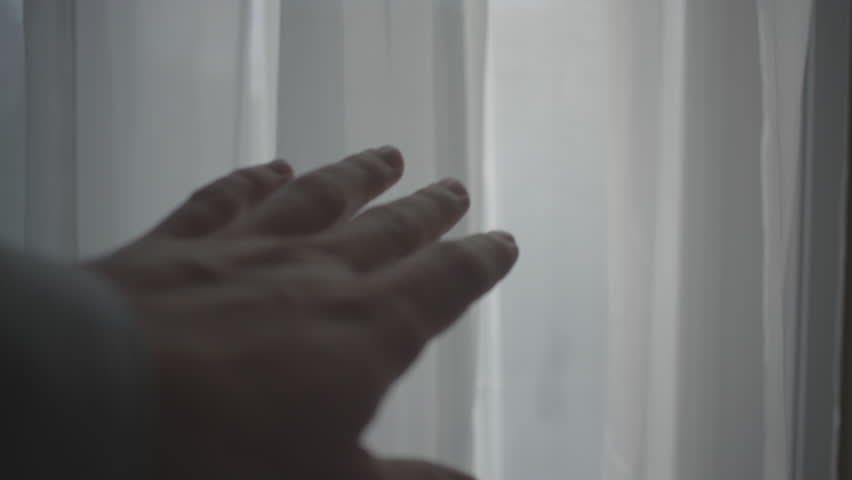 Hand Pulling Back White Curtain in Window | Shutterstock HD Video #1009741703