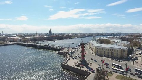 Aerial cinematic view of st. Petersburg city. Neva river panorama. Rostral Columns in St. Petersburg, Russia. Drone unique high altitude flight over city. Flight over St. Petersburg
