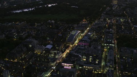 Aerial overhead night view City of London street lights Oxford Street to Marble Arch Hyde Park England UK RED WEAPON