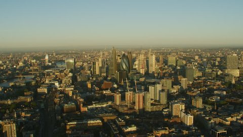 London UK - November 2017: Aerial view sunrise over London cityscape and financial district commercial skyscrapers Gherkin Cheesegrater Walkie Talkie England United Kingdom RED WEAPON
