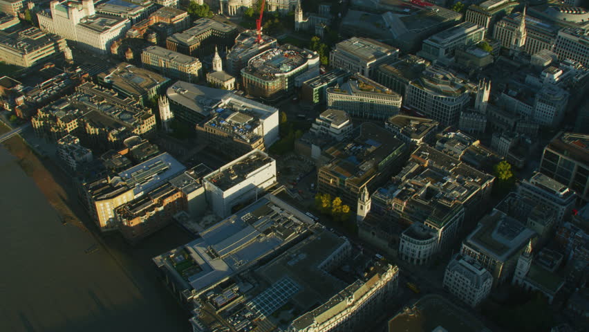 Aerial view commercial buildings along River Thames from Southwark Bridge sunrise over St Pauls Cathedral London England UK RED WEAPON | Shutterstock HD Video #1009745870