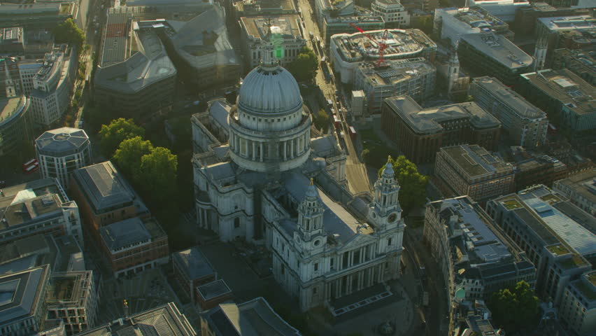 Aerial view sunrise with sun flare on dome St Pauls Cathedral Anglican Church Ludgate Hill London England UK RED WEAPON