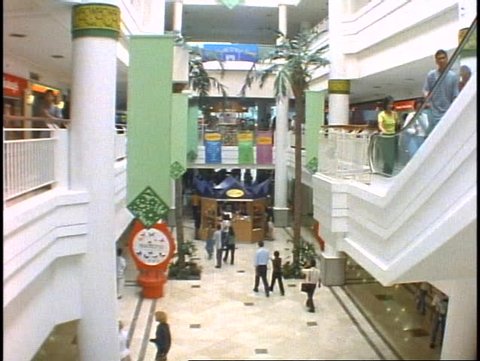 THE PHILIPPINES, 1998, Manila, Makita Shopping Mall interior, POV from escalator down