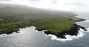 aerial flying towards coast over the ocean on Hawaii