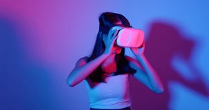 Woman looking though VR headset