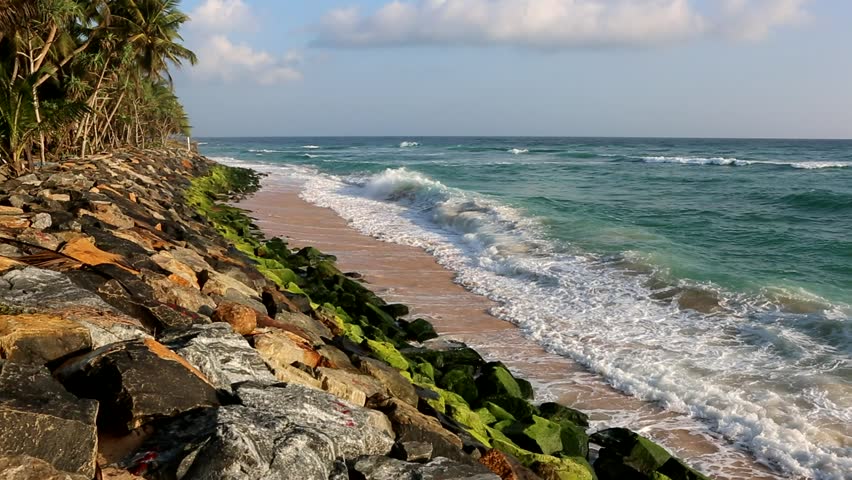 Seashore landscape, Sri Lanka. Beautiful Sea view as seen from the beach, seashore. Beach landscape (Beachscape). Waves and stones 