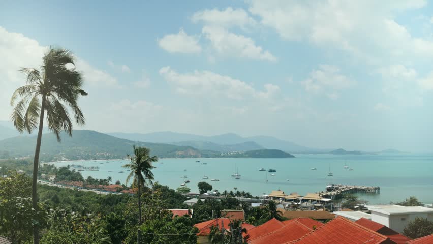 Bright sun coming out behing cloud on blue sky over ship and sea yachts standing at parking. Clouds moving and dissipating and bright sun in sky time lapse