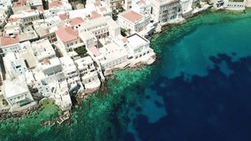 Aerial drone bird's eye view video of iconic and picturesque district of Vaporia with landmark church of Agios Nikolaos, city of Ermoupoli, Syros island, Capital of Cyclades ,Greece
