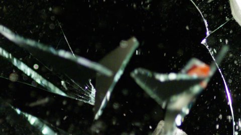 Glass shattering close up slow motion 