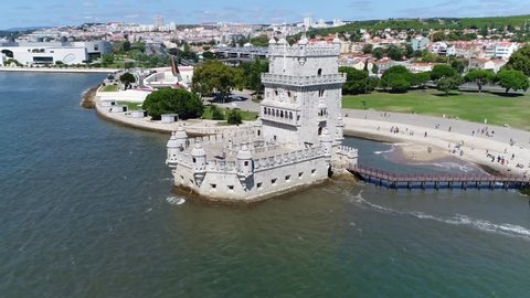 Aerial view of Belem Tower in Portuguese Torre de Belem or the Tower of Saint Vincent is fortified tower located in the civil parish of Santa Maria de Belem in the municipality of Lisbon Portugal 4k