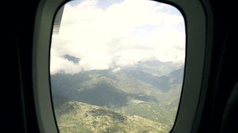 Looking at the Khumbu Valley through an Airplane Window on flight from Lukla, nepal.