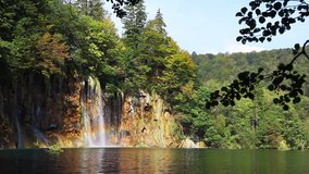 Splendid waterfalls in the wooded area. Location famous resort Plitvice National Park, Croatia, Europe. Scenic footage of popular tourist attraction. Discover the beauty of earth. Full HD 1080p video.