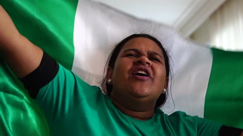 Nigeria Woman Celebrating National Flag Stock Footage Video (100%