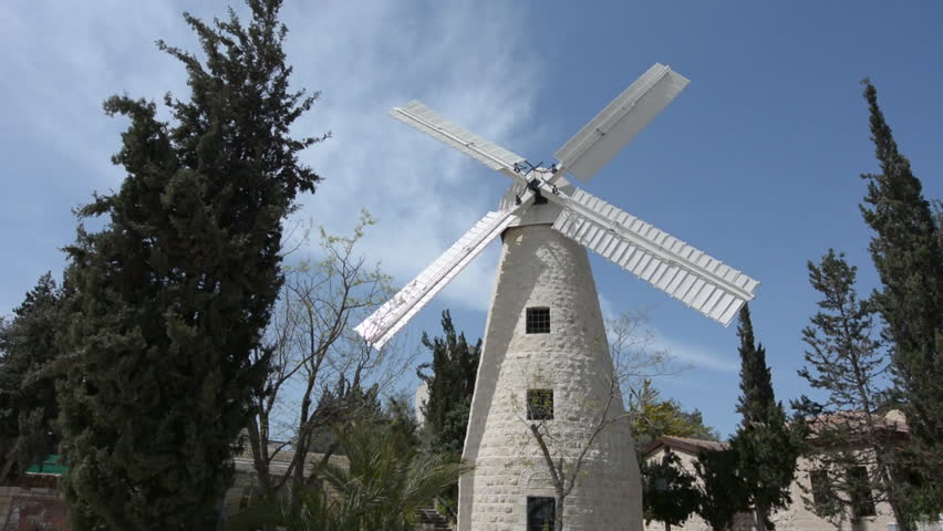 Montefiore Windmill turning on wind energy. It is a famous historical landmark wind mill tower located in Mishkenot Sha