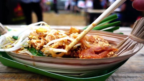 Pad Thai popular food in Bangkok, HD slow motion