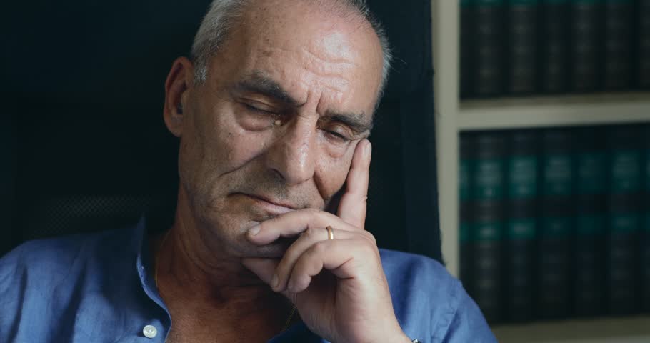 Thoughtful and sad old man- indoor | Shutterstock HD Video #1009876919