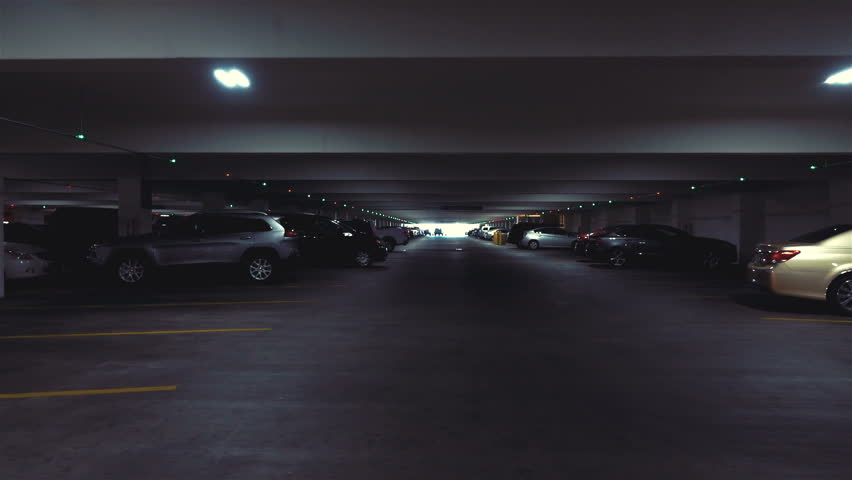 Professional video of POV drive through underground parking garage in slow motion 120fps Royalty-Free Stock Footage #1009879418