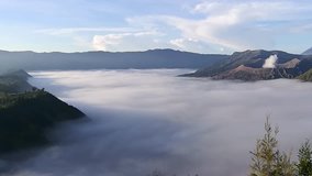 4K Cinematic Timelapse of The  Dancing Carpet Clouds of Bromo, Indonesia and the persistent smoke from the still active volcano.
