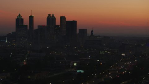 Atlanta - November 2017: Aerial dawn sunrise illuminated view of Atlanta Central downtown business finance district city skyscrapers and suburban Georgia USA