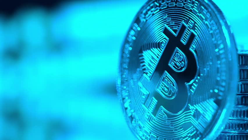 Crypto currency Gold Bitcoin, BTC, Bit Coins. Block chain technology, bitcoin mining concept in blue style, monitor with code at background | Shutterstock HD Video #1009931456