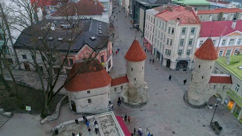 Tallinn / ESTONIA - April 15, 2018: Aerial of Tallinn old town famous gates opening onto the center