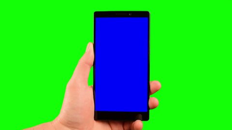 Phone in the hand close up isolated at green background. Phone screen is blue chroma key, background chroma key green screen. Footage for mobile ads, app promo. FullHD 16:9 vertical smartphone screen.