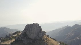 Drone over a peak with a cross in Calabria, Italy. Video shot in 4K with a DJI Mavic Pro 4