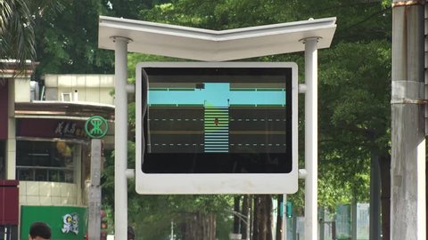 SHENZHEN, CHINA - CIRCA APRIL 2018 : FACIAL RECOGNITION TECHNOLOGY to identify jaywalkers and automatically issue them fines by text.  Offenders faces are displayed on screens at crossings.